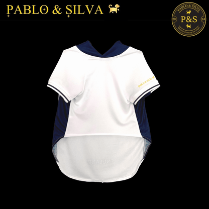 Front of the white England shirt with 'Pablo & Silva' branding on a black background