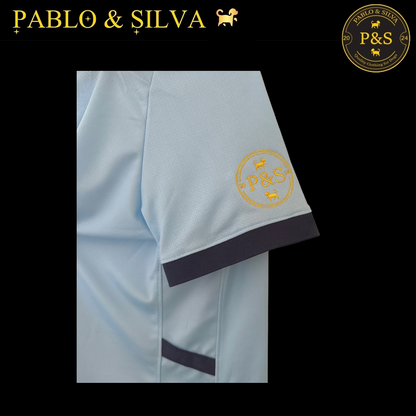 Man City shirt with embroidered logo on a black background, featuring the brand 'Pablo & Silva'.