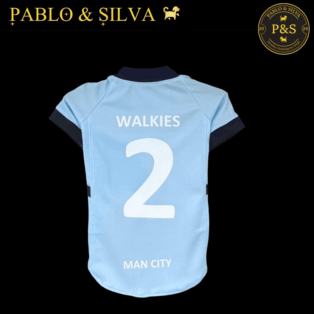 Man City shirt with 'WALKIES 2' and 'MAN CITY' text on a black background, featuring the Pablo & Silva brand.