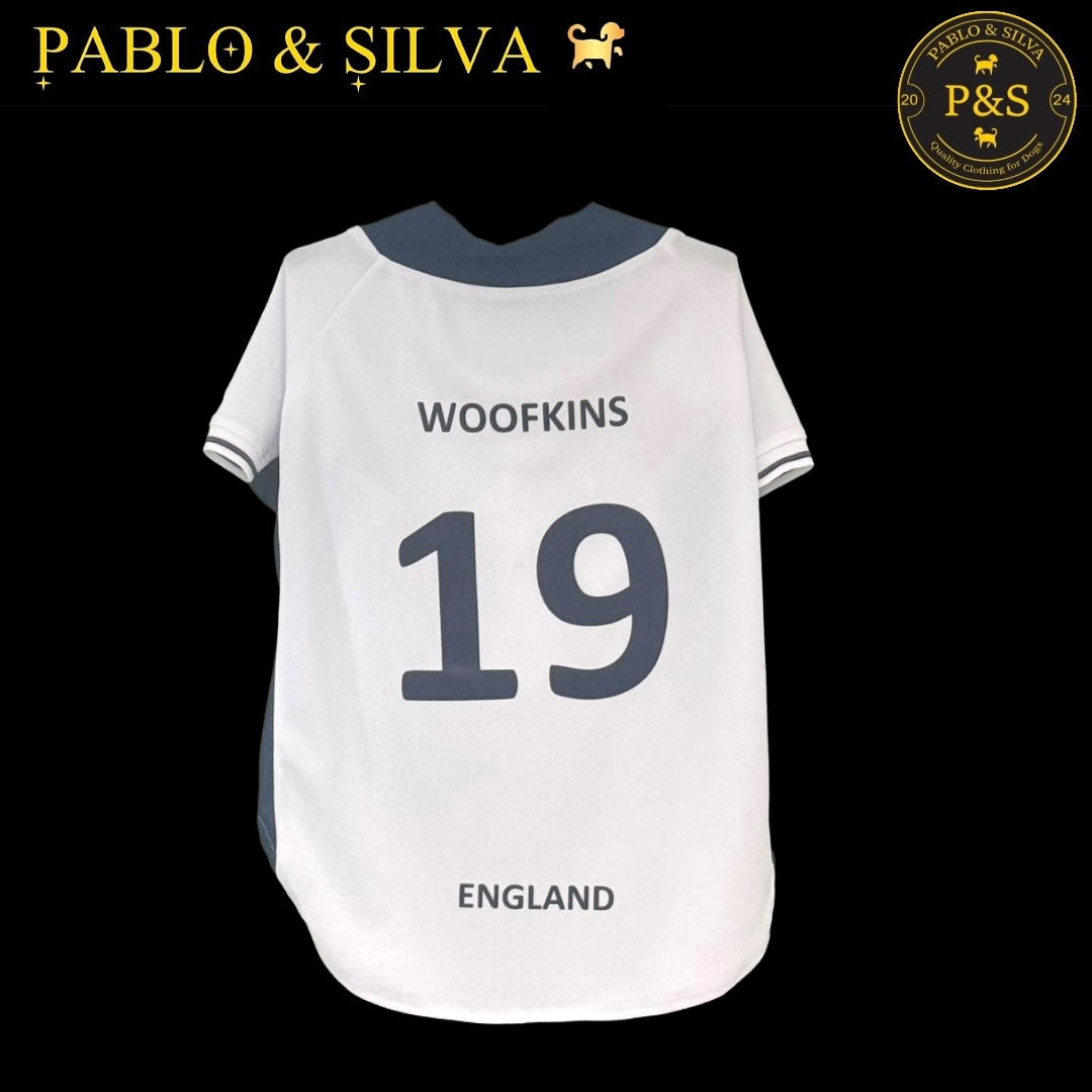 White England shirt with 'Woofkins' and number '19', branded 'Pablo & Silva'.